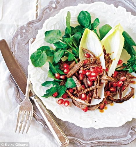 Shredded duck, watercress and pomegranate salad