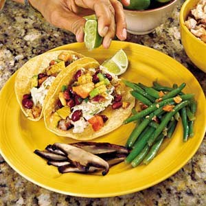 Shredded grilled tilapia tacos