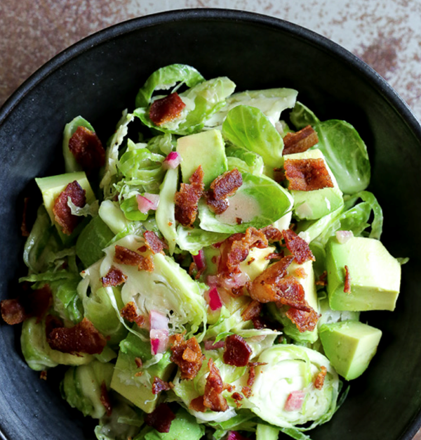 Shredded raw Brussels sprout salad with bacon and avocado