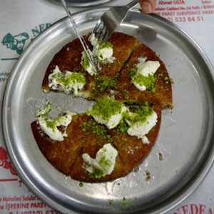 Shredded wheat and cheese pastry in syrup (Künefe)