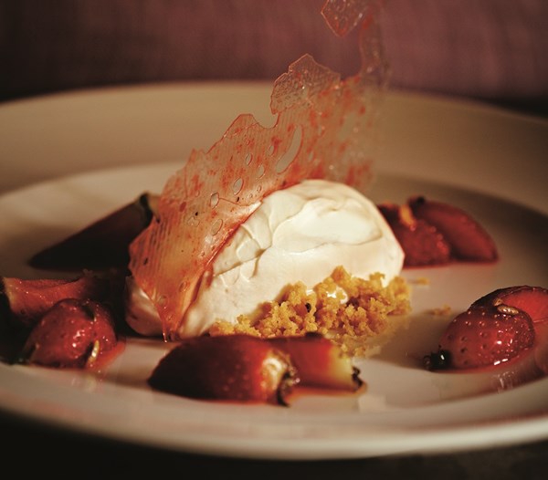 Shrikhand cheesecake with fennel- and coriander-flavoured strawberries