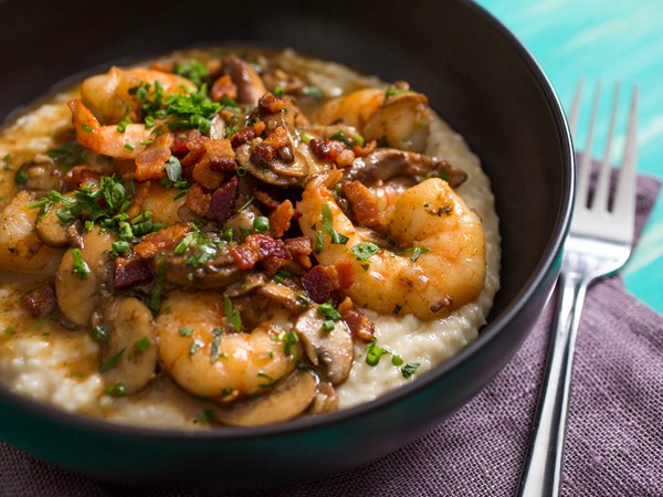 Shrimp and Gruyère cheese grits with bacon and mushrooms