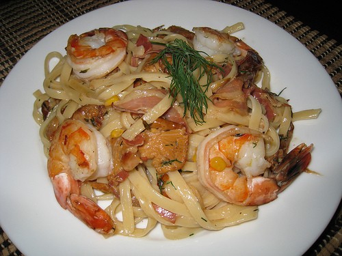 Shrimp and mushroom fettuccine with corn and pancetta