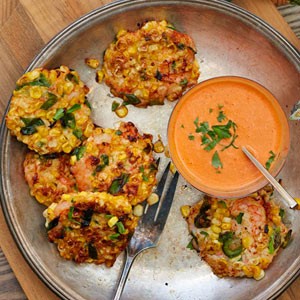 Shrimp corn fritters with red pepper sauce