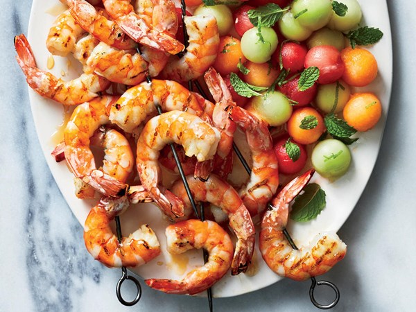 Shrimp kebabs with mint and melon salad