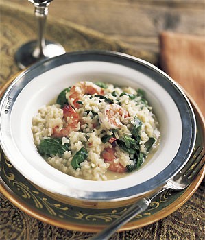 Shrimp risotto with baby spinach and basil