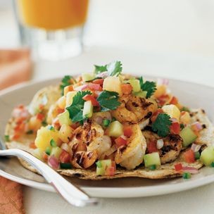 Shrimp tacos with melon-pineapple salsa