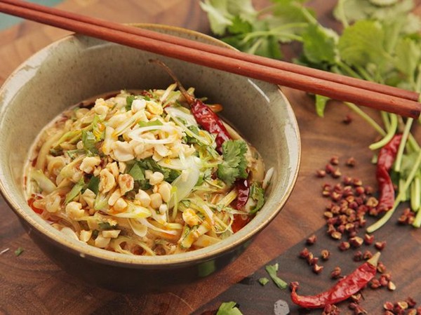 Sichuan shirataki sesame noodle salad with cucumber, sichuan peppercorn, chili oil, and peanuts 