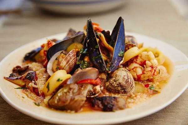 Sicilan seafood stew with almonds and couscous