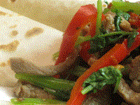 Silk Road fajitas (Báobĭng jiān níuròu / 薄餅煎牛肉)