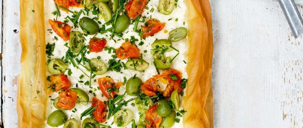 Simple goat's curd, olive and tomato tart