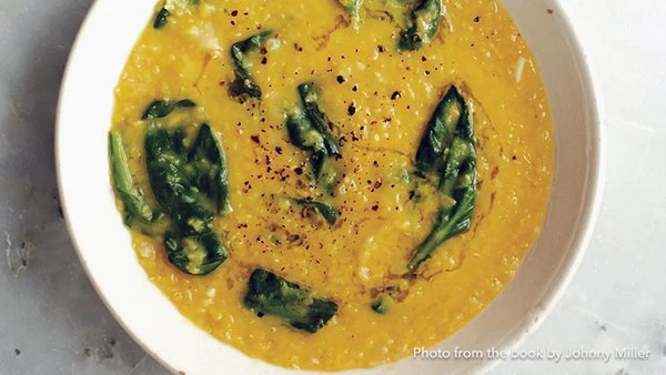 Simple red lentil soup with spinach, lemon, and pepper