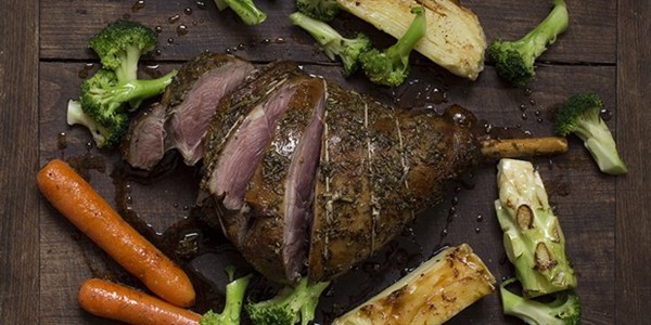 Simple roast leg of lamb with rosemary rub and potato Dauphinois