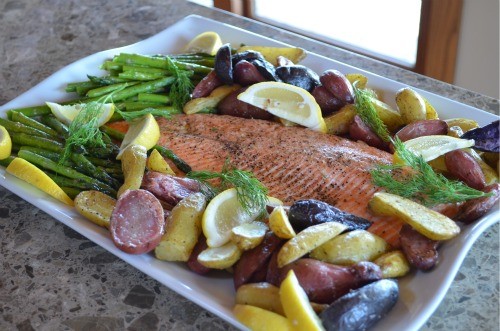 Simple roast salmon with potatoes, asparagus, and lemon-dill-caper drizzle