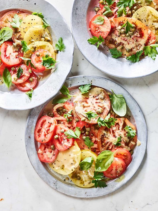 Simple tomato salad with tahini and herbs