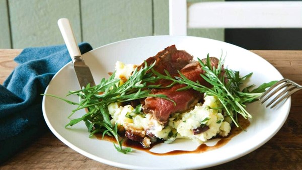 Sirloin steak with red wine jus and whipped anchovy and olive mash