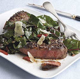 Sirloin steaks with garlicky Swiss chard