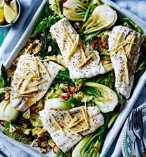 Sizzling haddock with greens and sesame seeds