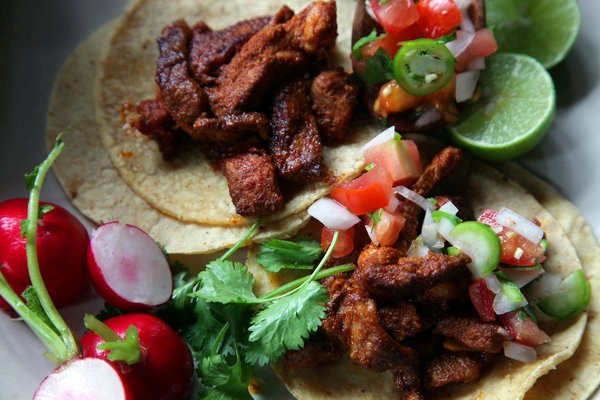 Sizzling pork tacos