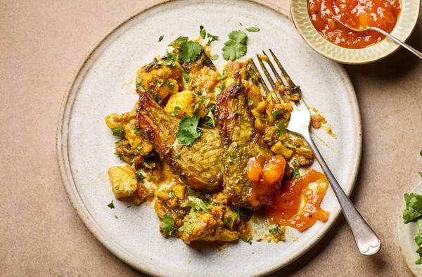 Sizzling spiced lamb cutlets with aloo gobi saag