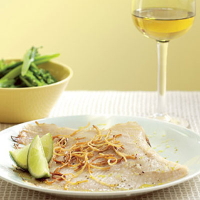 Skate wings with candied ginger shreds, lime and avocado oil