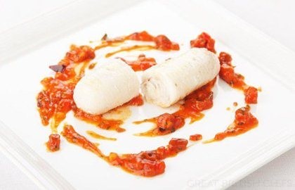 Skate with chorizo, olive and onion sauce