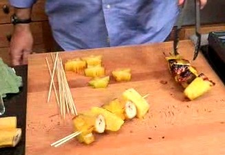 Skewered grilled fruit with ginger syrup