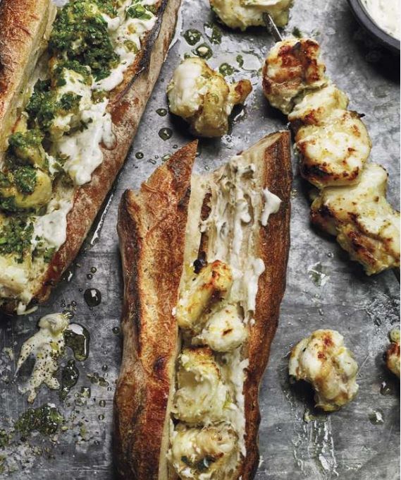 Skewered monkfish kebabs with green charmoula dressing & caper mayonnaise
