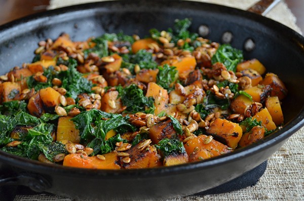 Skillet butternut squash and kale with maple-roasted pumpkin seeds