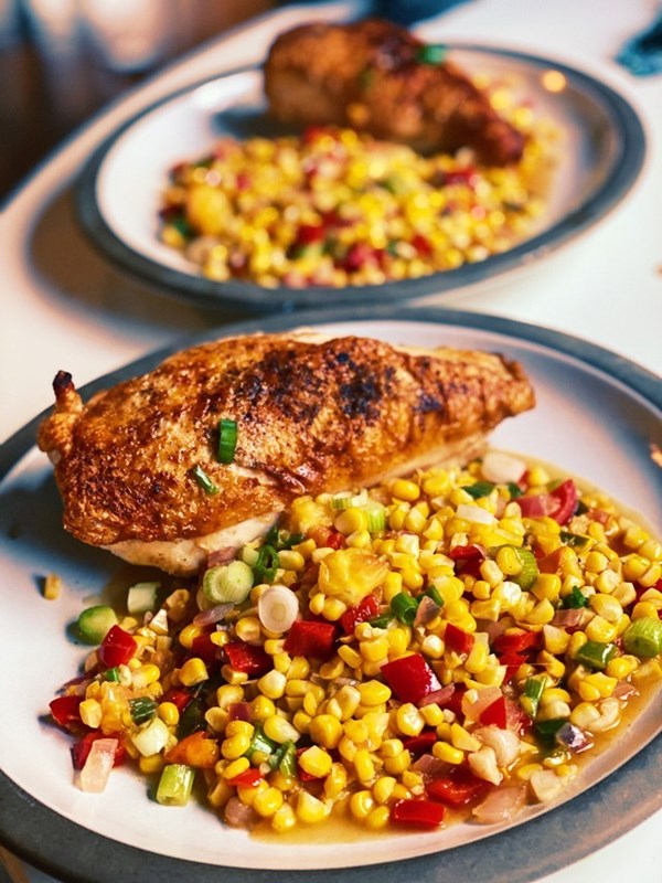 Skillet chicken breasts with corn, peppers, and scallions