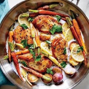 Skillet chicken with roasted potatoes and carrots