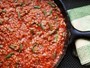 Skillet ground lamb with tomato sauce, green beans, and couscous