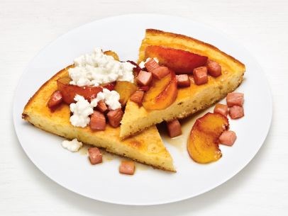 Skillet pancakes with Canadian bacon and peaches