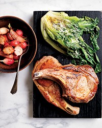 Skillet pork chops with warm escarole Caesar