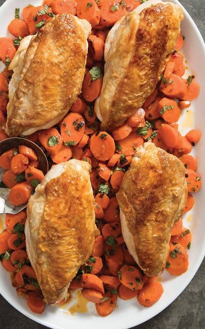 Skillet-roasted chicken breasts with harissa-mint carrots