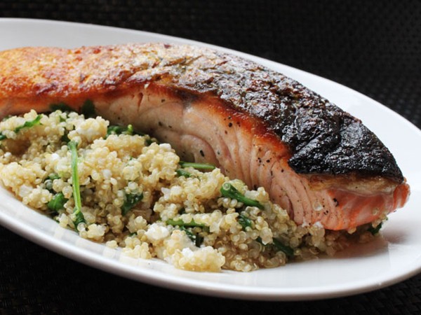 Skillet salmon with quinoa, feta and arugula