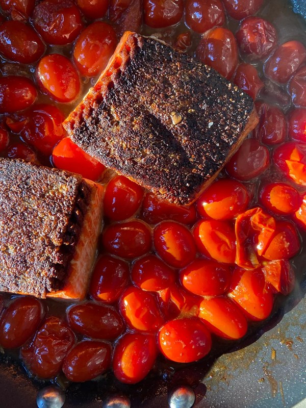 Skillet salmon with soy-butter tomatoes