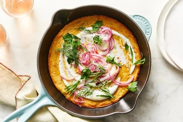 Skillet socca with spiced yogurt & herbs