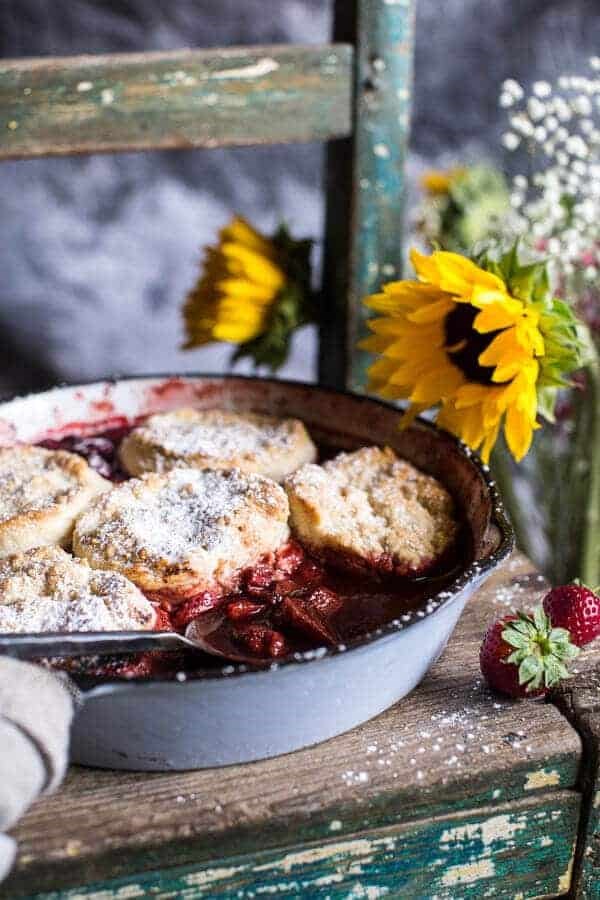 Skillet strawberry cobbler with cream cheese swirled biscuits