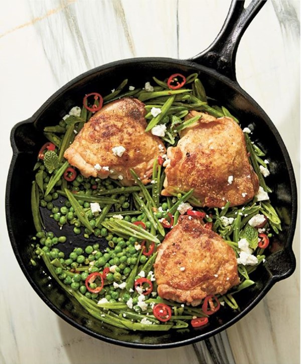 Skillet thighs with peas & pickled chiles
