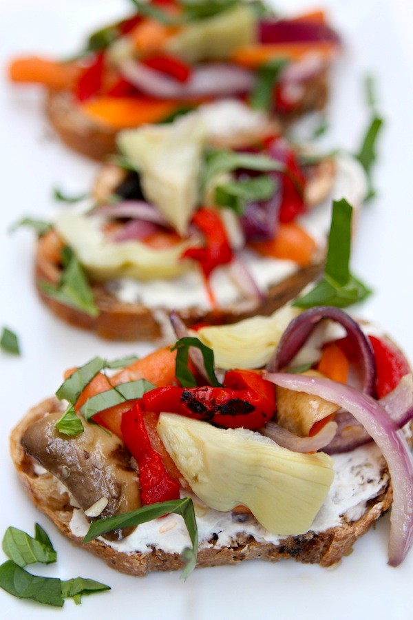 Skillet vegetables on cheese toast
