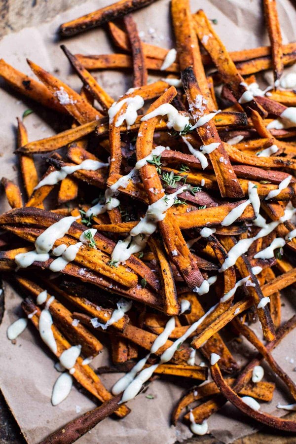 Skinny Cajun sweet potato fries with garlic cheese sauce