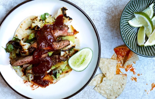 Skirt steak fajitas with grilled cabbage and scallions