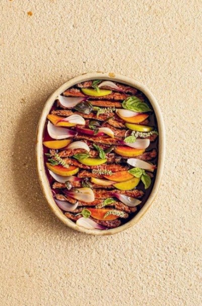 Skirt steak, sour plum, pearl onions