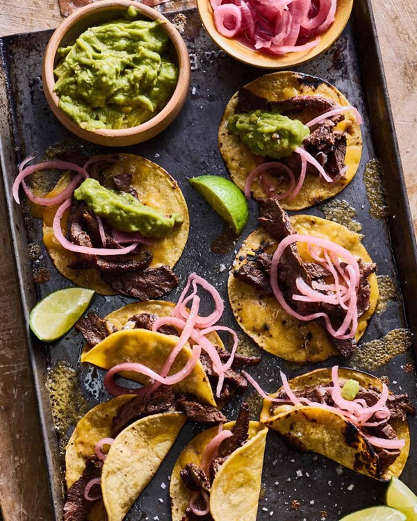 Skirt steak tacos with cheesy tortillas