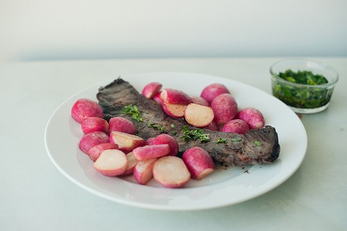 Skirt steak with buttered radishes