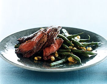 Skirt steak with haricots verts, corn, and pesto