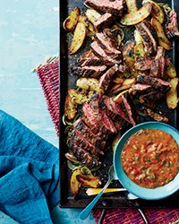 Skirt steak with roasted tomato chimichurri and potatoes