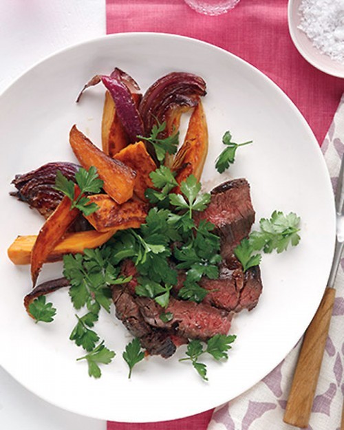 Skirt steak with sweet potato wedges and parsley salad