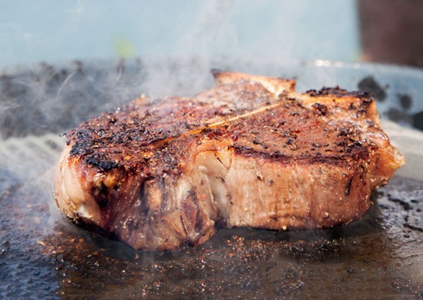 Slate-grilled porterhouse, summer vegetables, and sourdough bread
